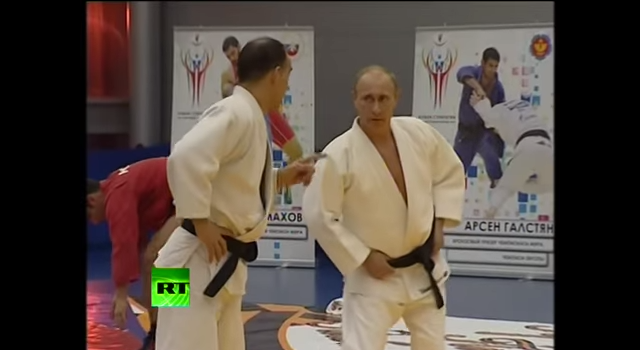 Vladimir Putin warms up for judo